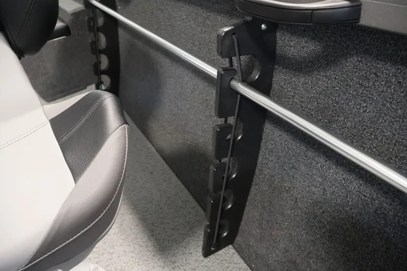 Slide: The Image of Interior of 2026 Crestliner 1750 Fish Hawk SC boat, featuring seating and rod storage. - 35