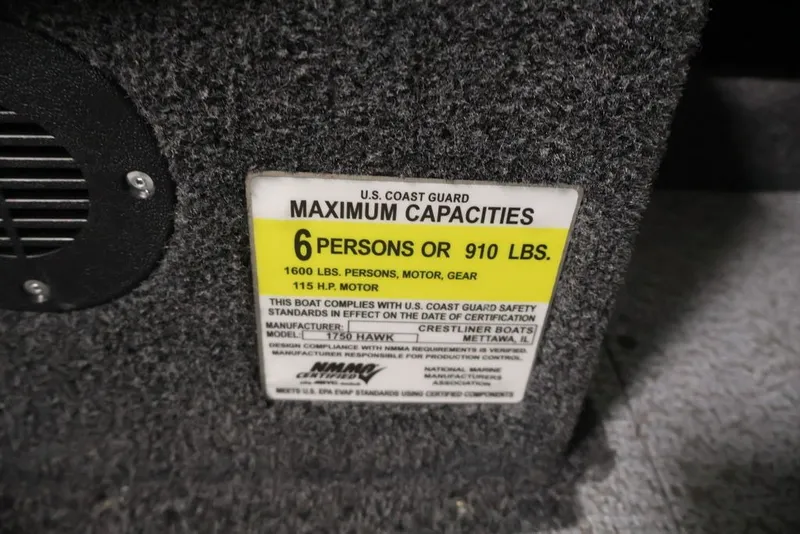 Slide: The Image of 2026 Crestliner 1750 Fish Hawk SC capacity label, 6 persons or 910 lbs limit. - 18
