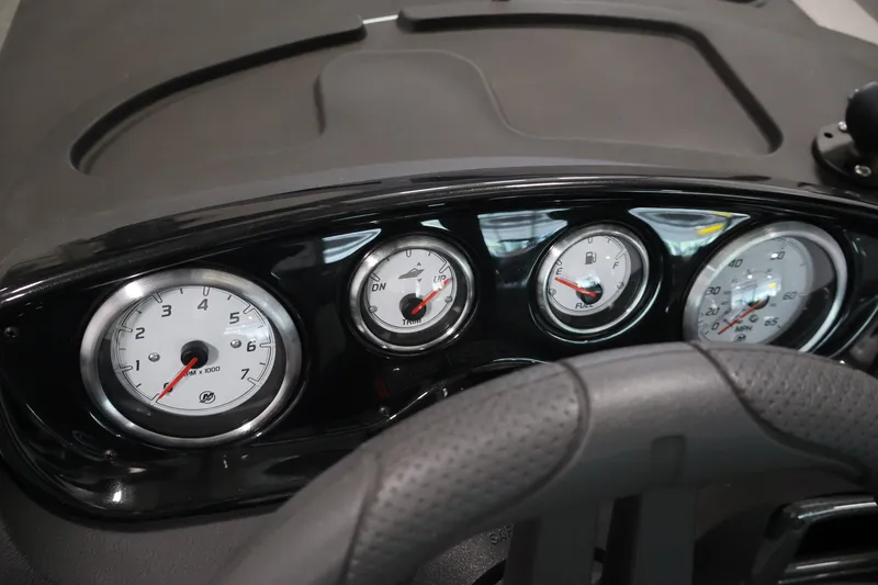 Slide: The Image of Dashboard of 2026 Crestliner 1750 Fish Hawk SC boat with gauges and steering wheel. - 28