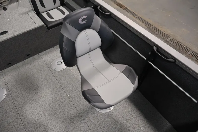 Slide: The Image of 2026 Crestliner 1750 Fish Hawk SC boat seat, gray and black design. - 34