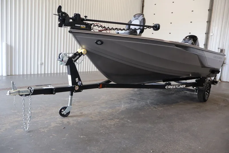 Slide: The Image of 2026 Crestliner 1750 Fish Hawk SC boat on trailer in indoor setting. - 43