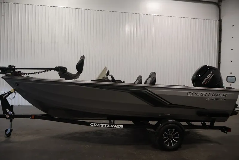 Slide: The Image of 2026 Crestliner 1750 Fish Hawk SC boat in a showroom, side view. - 44