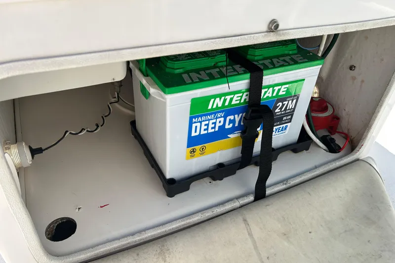 Slide: The Image of Marine battery in a 1996 Wellcraft 160 Fisherman boat compartment. - 13