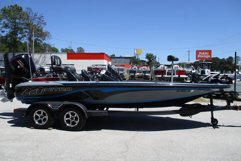 Slide: The Image of 2022 Nitro Z20 boat on trailer in outdoor storage lot. - 13
