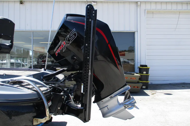 Slide: The Image of 2022 Nitro Z20 boat with Mercury Pro XS outboard motor in a dealership lot. - 16