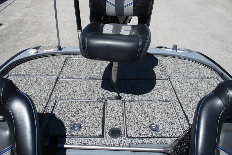 Slide: The Image of 2022 Nitro Z20 boat deck with seating and storage compartments. - 24