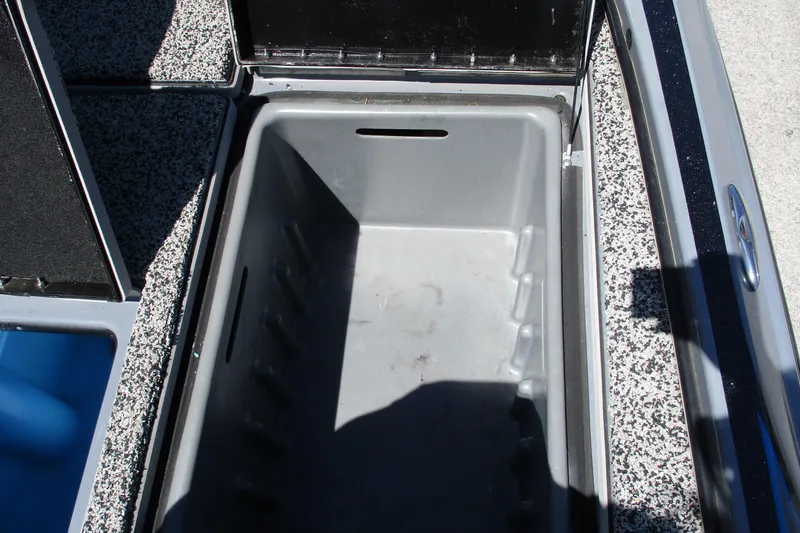 Slide: The Image of Open storage compartment in a 2022 Nitro Z20 boat, featuring a spacious interior. - 26