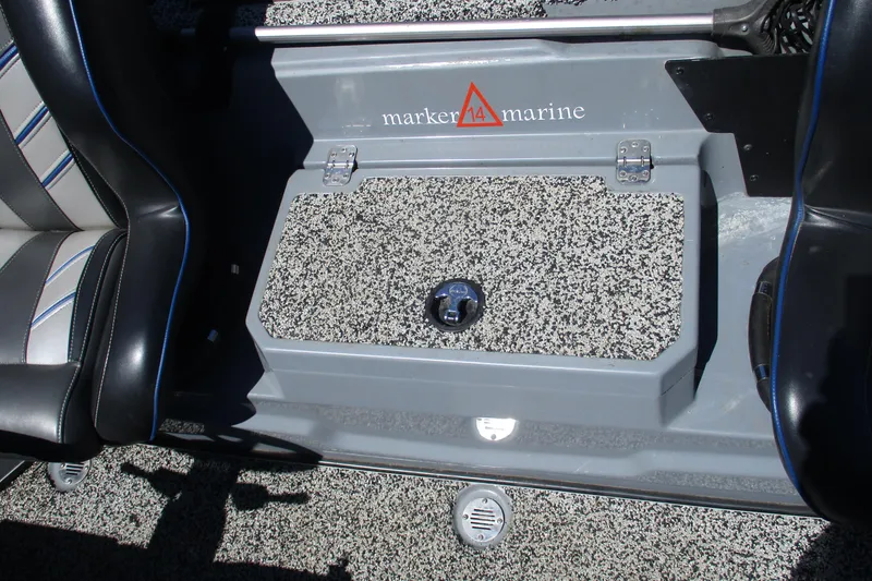 Slide: The Image of Interior of a 2022 Nitro Z20 boat featuring a speckled storage compartment and seating. - 30
