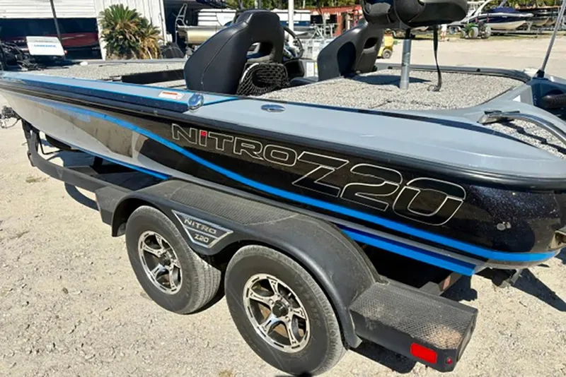 Slide: The Image of 2022 Nitro Z20 boat on trailer, featuring sleek design and dual seats. - 6