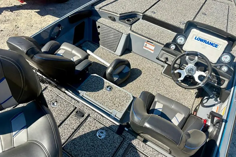 Slide: The Image of 2022 Nitro Z20 boat interior with steering wheel, seats, and Lowrance electronics. - 9