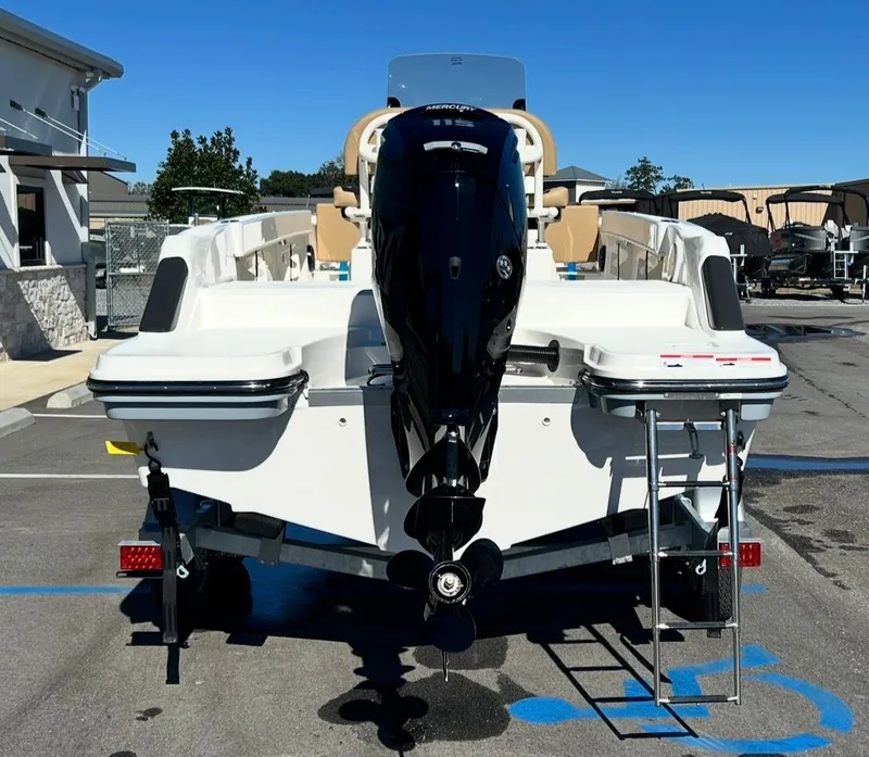 Slide: The Image of Rear view of 2026 Bayliner TROPHY CC20 boat with outboard motor. - 5