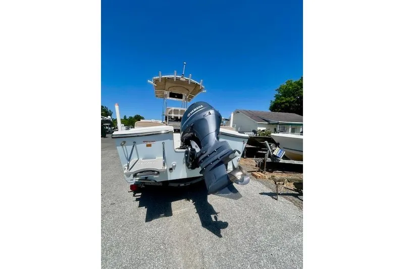 Slide: The Image of 2019 Parker 21 Special Edition boat with Yamaha outboard motor on trailer. - 10