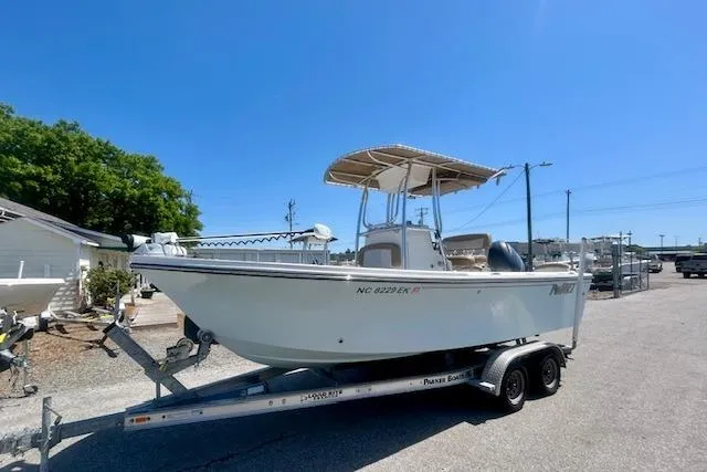 Slide: The Image of 2019 Parker 21 Special Edition boat on trailer, sunny day, clear blue sky. - 9