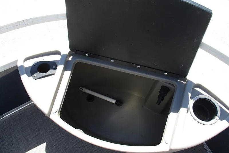 Slide: The Image of Open storage compartment on 2023 Sun Tracker Bass Buggy 18 DLX boat. - 14