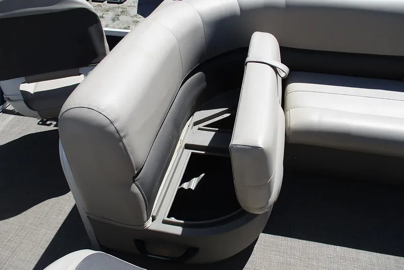 Slide: The Image of 2023 Sun Tracker Bass Buggy 18 DLX boat seating with storage compartment. - 18