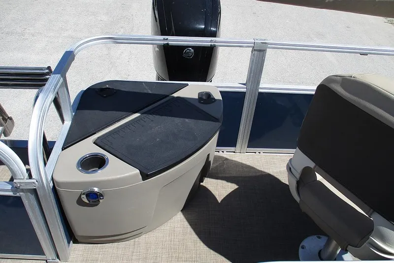 Slide: The Image of 2023 Sun Tracker Bass Buggy 18 DLX boat interior with seating and control panel. - 20