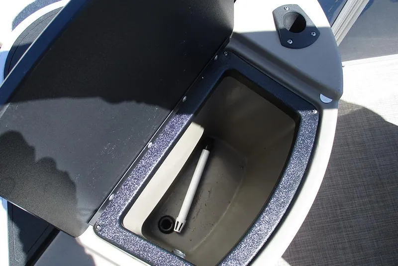 Slide: The Image of Open storage compartment on 2023 Sun Tracker Bass Buggy 18 DLX boat. - 22
