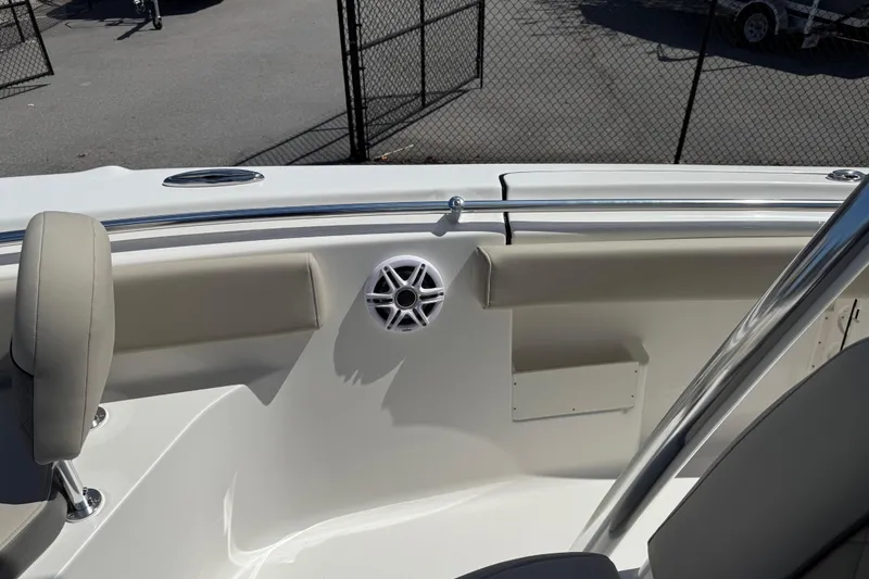 Slide: The Image of 2026 Key West 239 FS boat interior with cushioned seating and speaker system. - 13