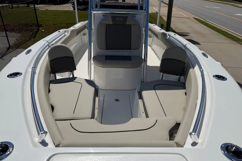 Slide: The Image of 2026 Key West 239 FS boat interior with cushioned seating and sleek design. - 14