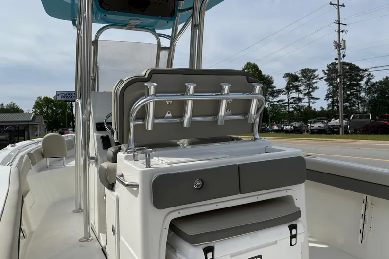 Slide: The Image of 2026 Key West 239 FS boat interior with seating and rod holders. - 20