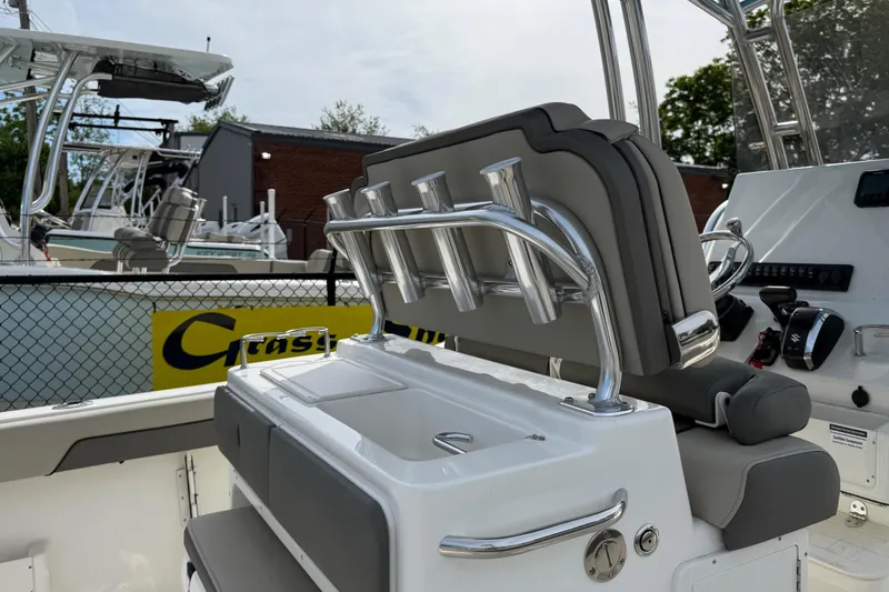 Slide: The Image of 2026 Key West 239 FS boat interior with rod holders and seating. - 21