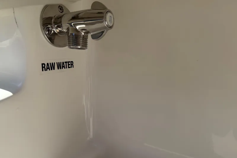Slide: The Image of 2026 Key West 239 FS boat raw water outlet detail. - 27