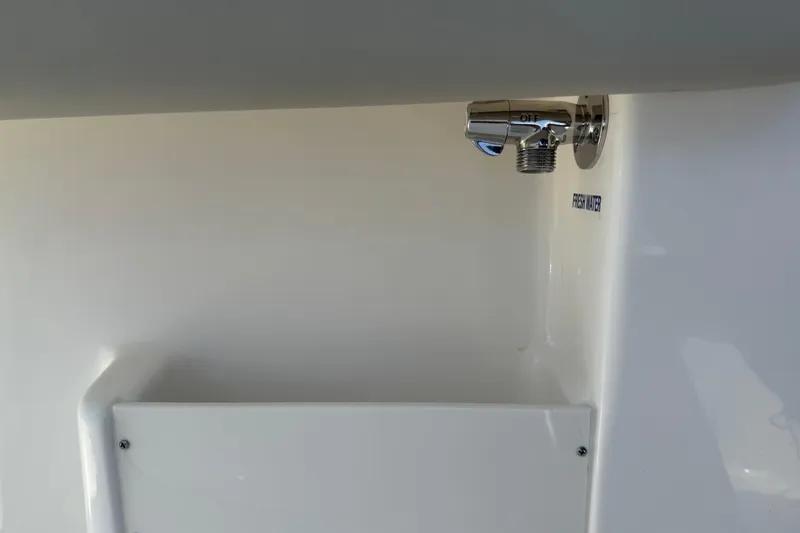 Slide: The Image of Freshwater outlet on 2026 Key West 239 FS boat, featuring a sleek chrome faucet. - 36