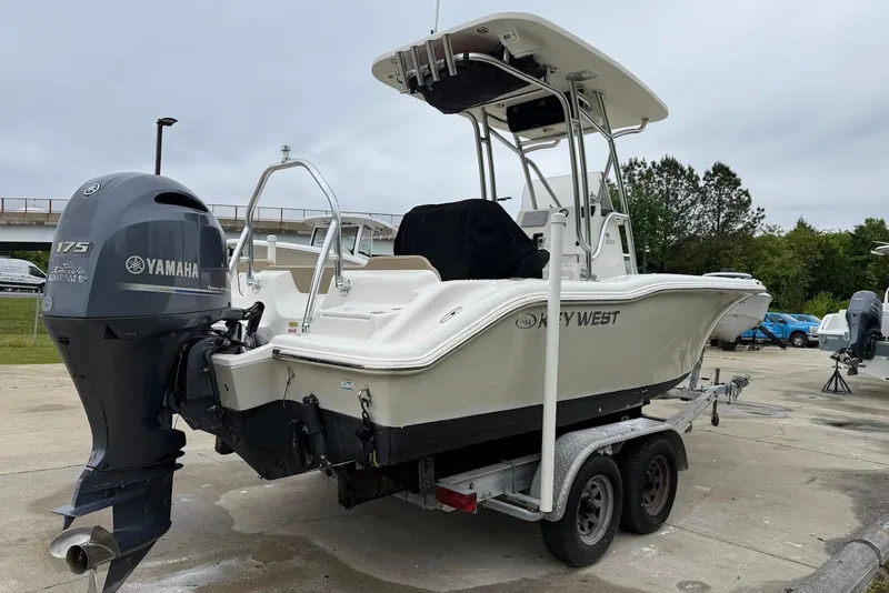 Slide: The Image of 2016 Key West 219 FS boat with Yamaha 175 engine on a trailer. - 17