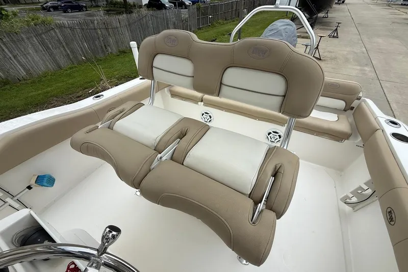 Slide: The Image of 2016 Key West 219 FS boat interior with beige and white seating. - 24