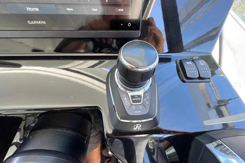 Slide: The Image of Control panel of a 2021 Beneteau Antares 11 with Garmin navigation system. - 35