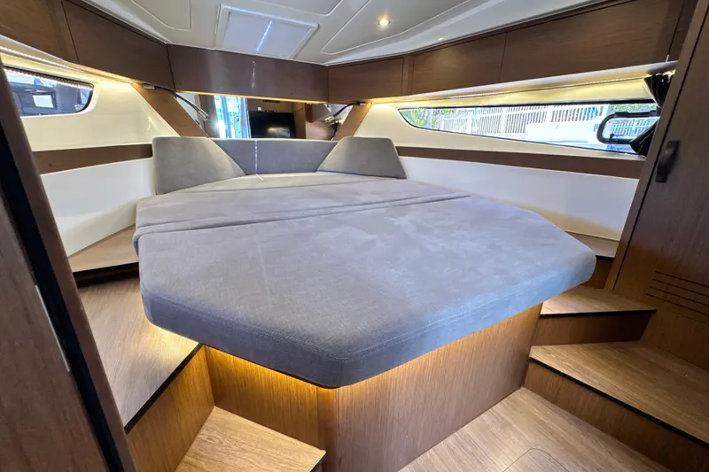 Slide: The Image of Luxurious cabin interior of 2021 Beneteau Antares 11 with modern design and ambient lighting. - 50