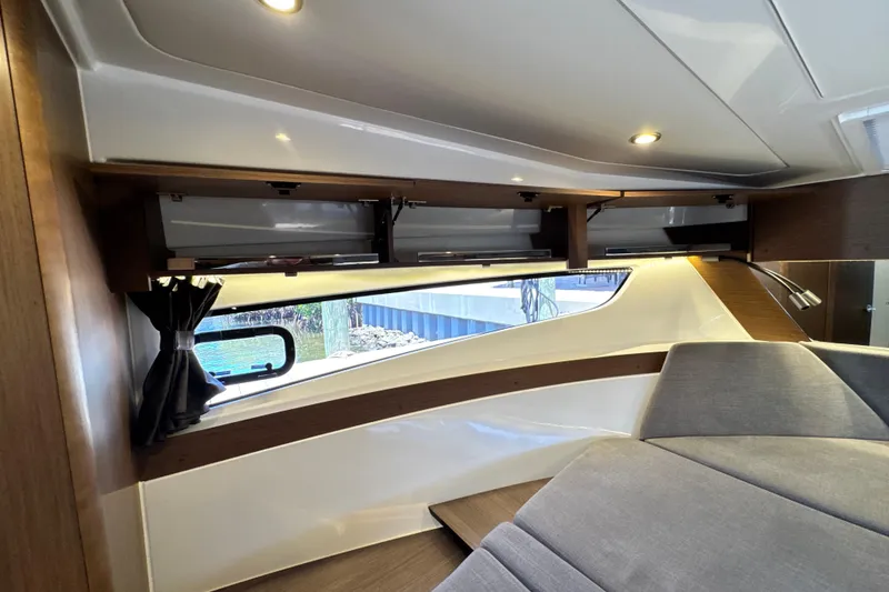 Slide: The Image of Interior of 2021 Beneteau Antares 11, featuring modern design and comfortable seating. - 53