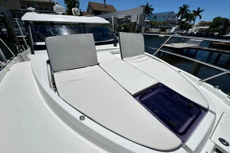 Slide: The Image of 2021 Beneteau Antares 11 boat with sunbathing deck and waterfront view. - 64
