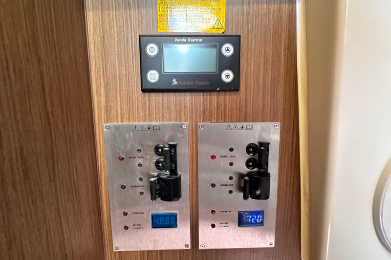 Slide: The Image of Control panel on a 2021 Beneteau Antares 11 boat with digital displays. - 67