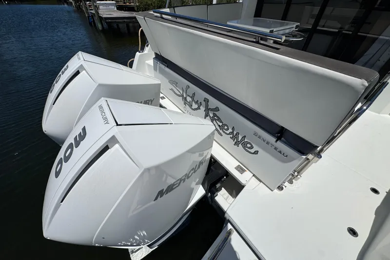 Slide: The Image of 2021 Beneteau Antares 11 with twin Mercury 300 outboard engines docked. - 9