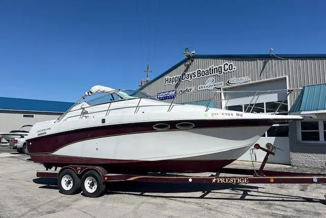 Slide: The Image of 1997 Crownline 250 CR boat on trailer at Happy Days Boating Co. - 2