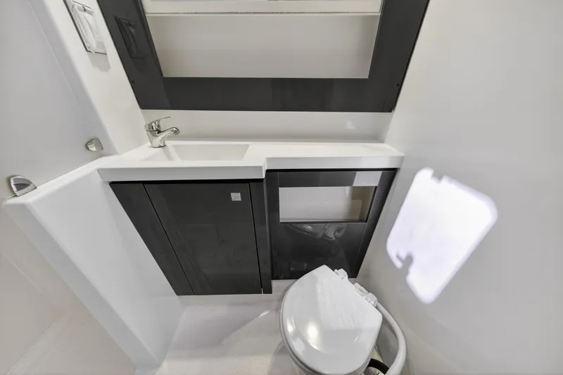 Slide: The Image of Bathroom interior of 2015 Fountaine Pajot Helia 44 catamaran, featuring sink and toilet. - 107