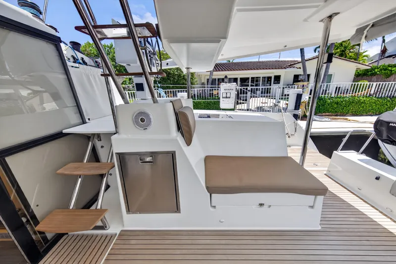 Slide: The Image of 2015 Fountaine Pajot Helia 44 yacht deck with seating and storage. - 15
