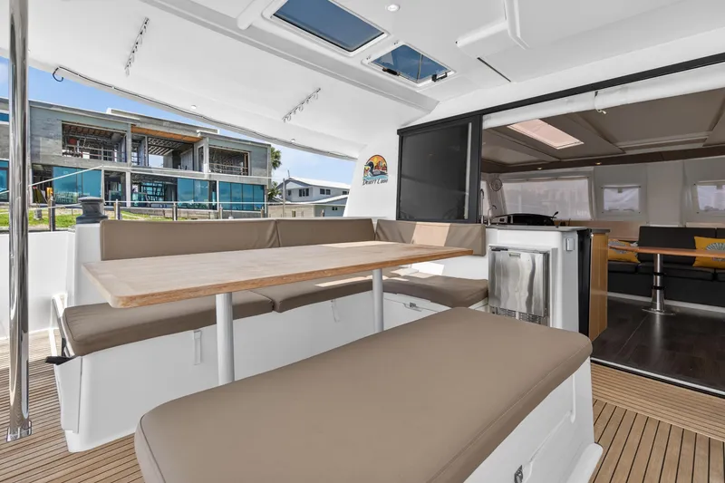 Slide: The Image of Spacious interior of 2015 Fountaine Pajot Helia 44 catamaran with modern seating and dining area. - 17