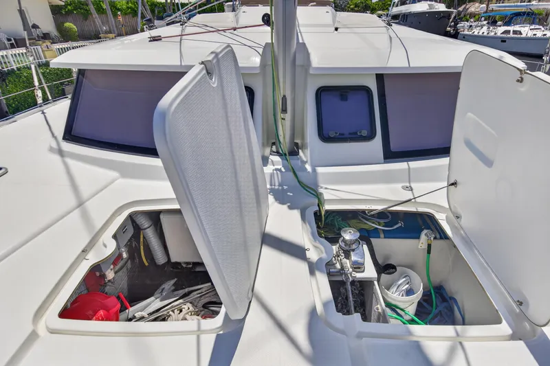 Slide: The Image of Open storage compartments on a 2015 Fountaine Pajot Helia 44 catamaran deck. - 39