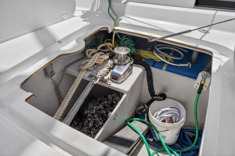 Slide: The Image of Storage compartment of 2015 Fountaine Pajot Helia 44 with ropes, chains, and equipment. - 41