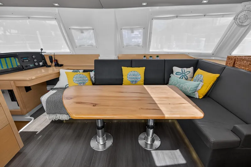 Slide: The Image of Interior of 2015 Fountaine Pajot Helia 44 catamaran with cozy seating and nautical decor. - 59