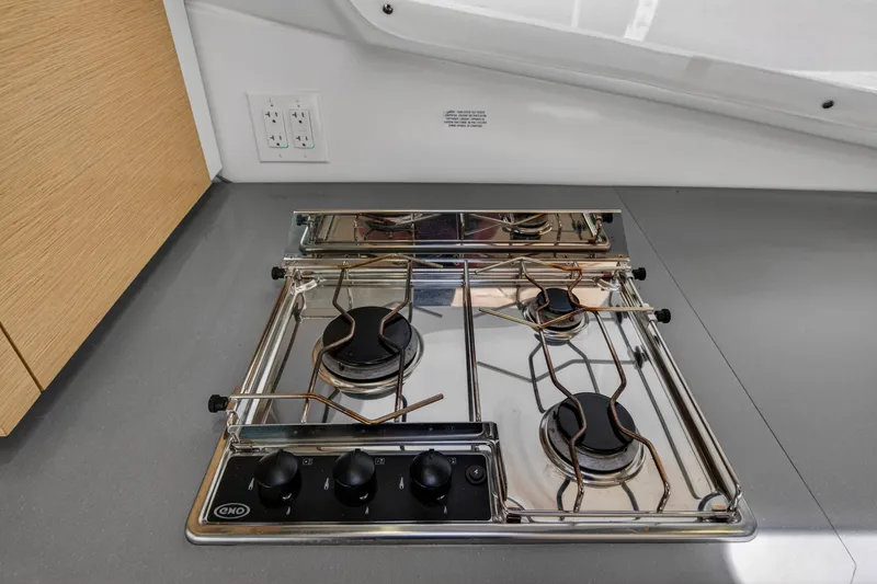 Slide: The Image of Modern kitchen stove on 2015 Fountaine Pajot Helia 44 catamaran, featuring sleek design and functionality. - 67