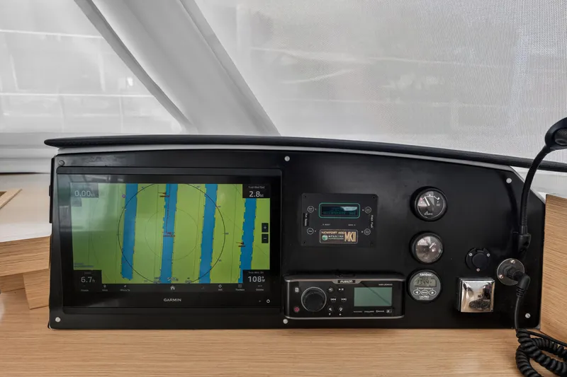 Slide: The Image of Control panel of a 2015 Fountaine Pajot Helia 44 catamaran with navigation equipment. - 72