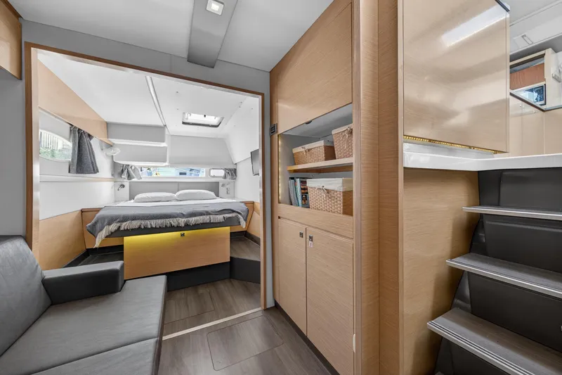 Slide: The Image of Luxurious interior of 2015 Fountaine Pajot Helia 44 catamaran with modern bedroom and storage. - 74