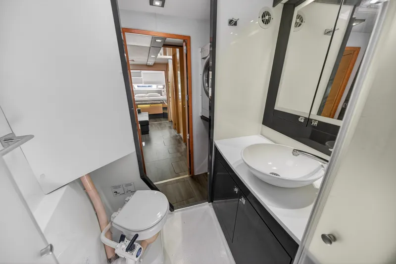 Slide: The Image of Bathroom interior of 2015 Fountaine Pajot Helia 44 catamaran, featuring modern sink and toilet. - 88