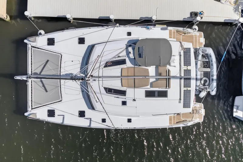 Slide: The Image of Overhead view of 2015 Fountaine Pajot Helia 44 catamaran docked at marina. - 9