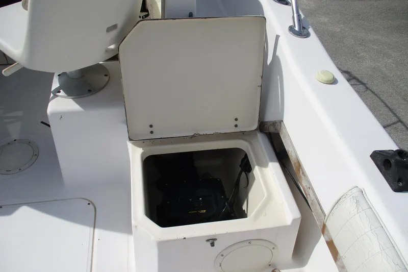 Slide: The Image of Open storage compartment on 1995 Grady-White Adventure 208 boat deck. - 20