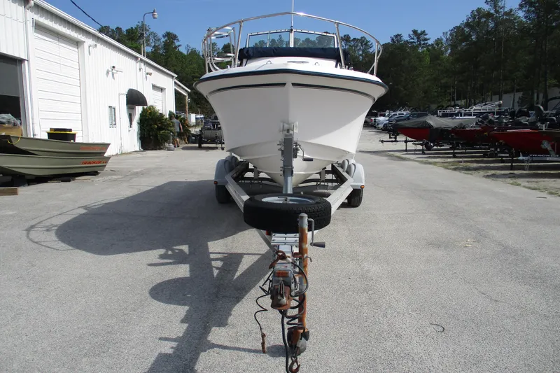 Slide: The Image of 1995 Grady-White Adventure 208 boat on trailer in outdoor storage area. - 4