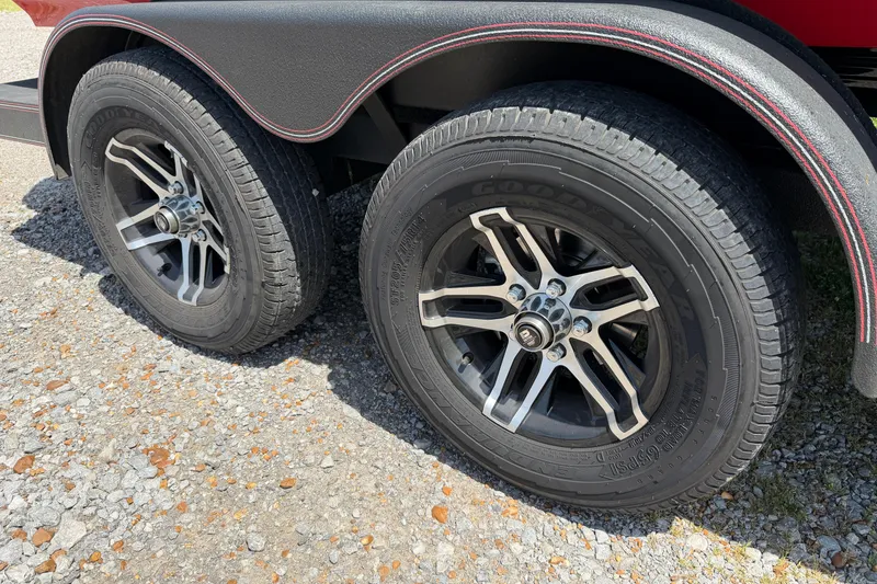 Slide: The Image of Dual wheels on a 2025 Skeeter ZXR21 trailer, featuring stylish alloy rims. - 19